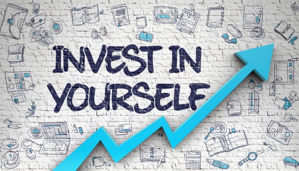 Invest In Yourself Drawn on White Brick Wall. 3D